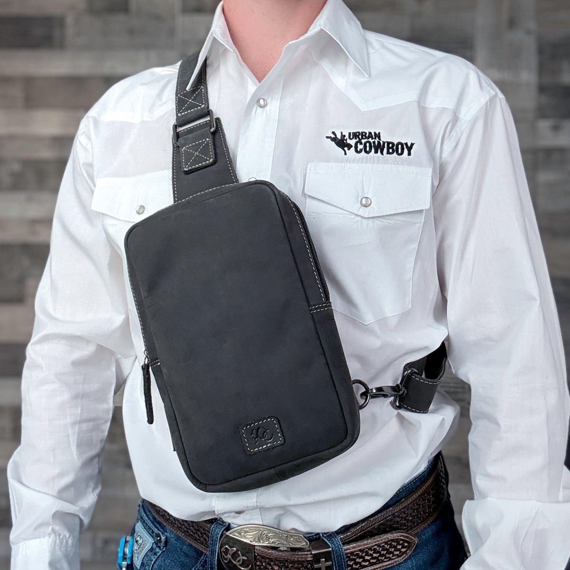 Black sling staged